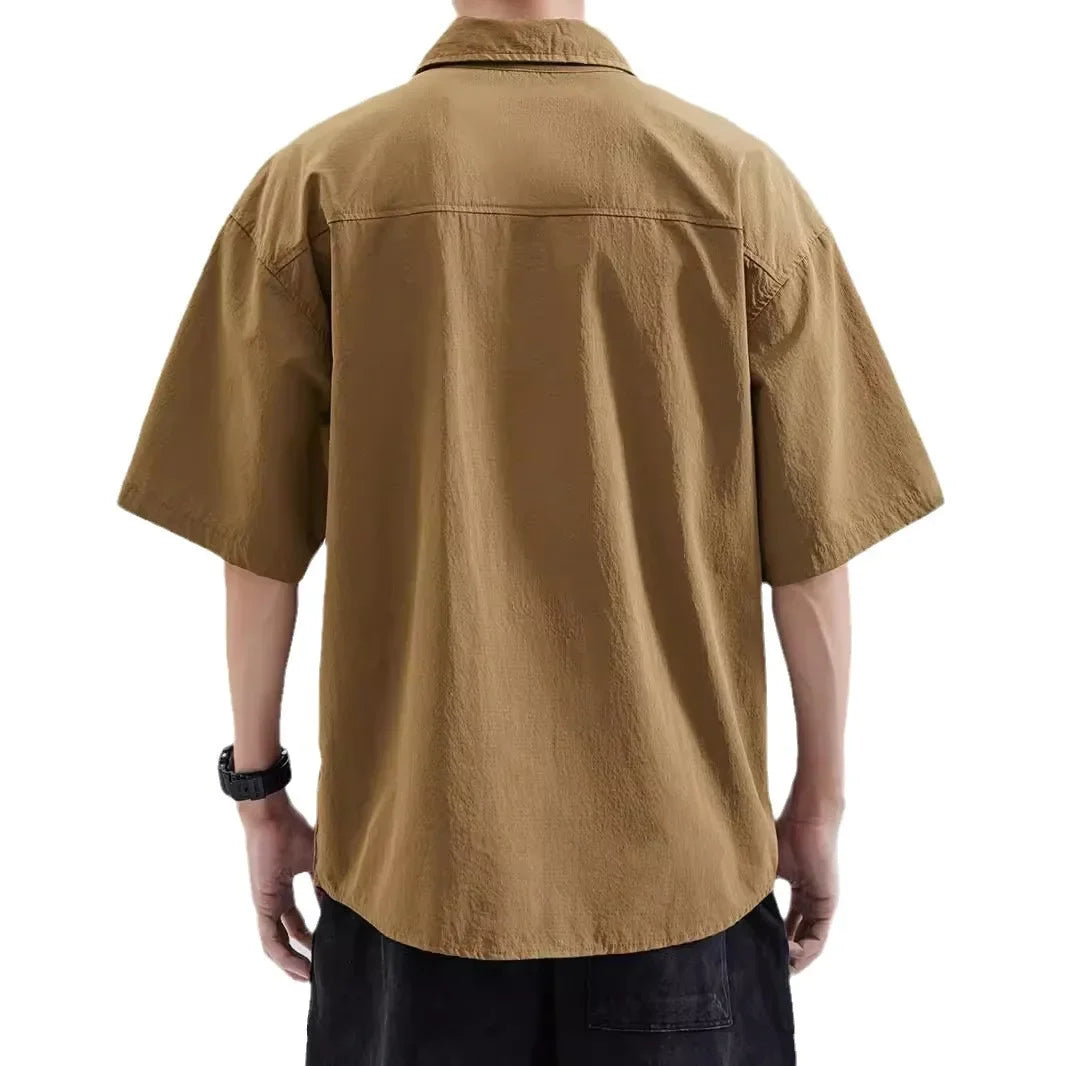 Nexo Button-up T-shirt