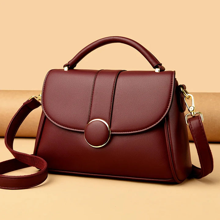 Lorvella Notch Handbag
