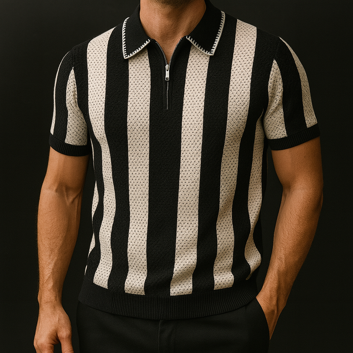 Black and white striped shirt worn by a person on a black background